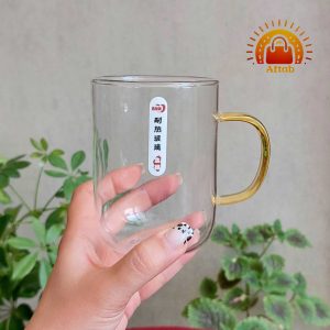 Alternative view of لیوان پیرکس پایین قوص دسته زرد وارداتی (تکی)